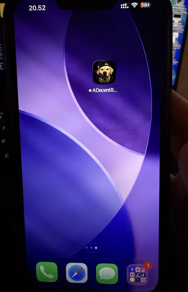 The A Decent Remote icon on an iPhone home screen at night